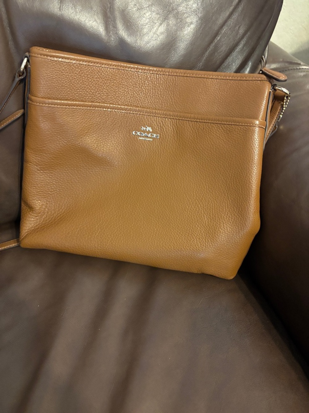 Coach Pebbled Leather Messenger Bag in Cognac Brown